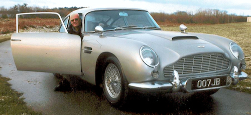 Lynn Philip Hodgson sits inside the James Bond Aston Martin DB5 at Camp-X December 2nd, 2005