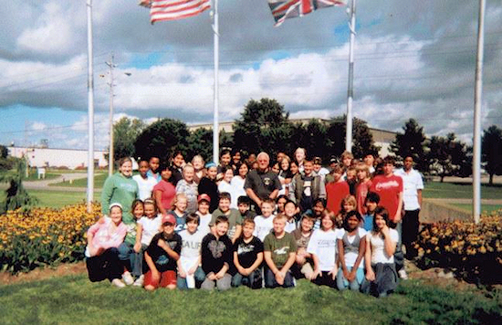 Lynn at the Camp-X monument with the students of Fallingbrook Public School